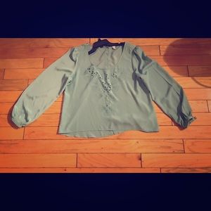 Blouse with buttons in the back